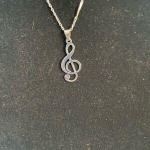Elegant Silver Treble Clef Pendant Necklace